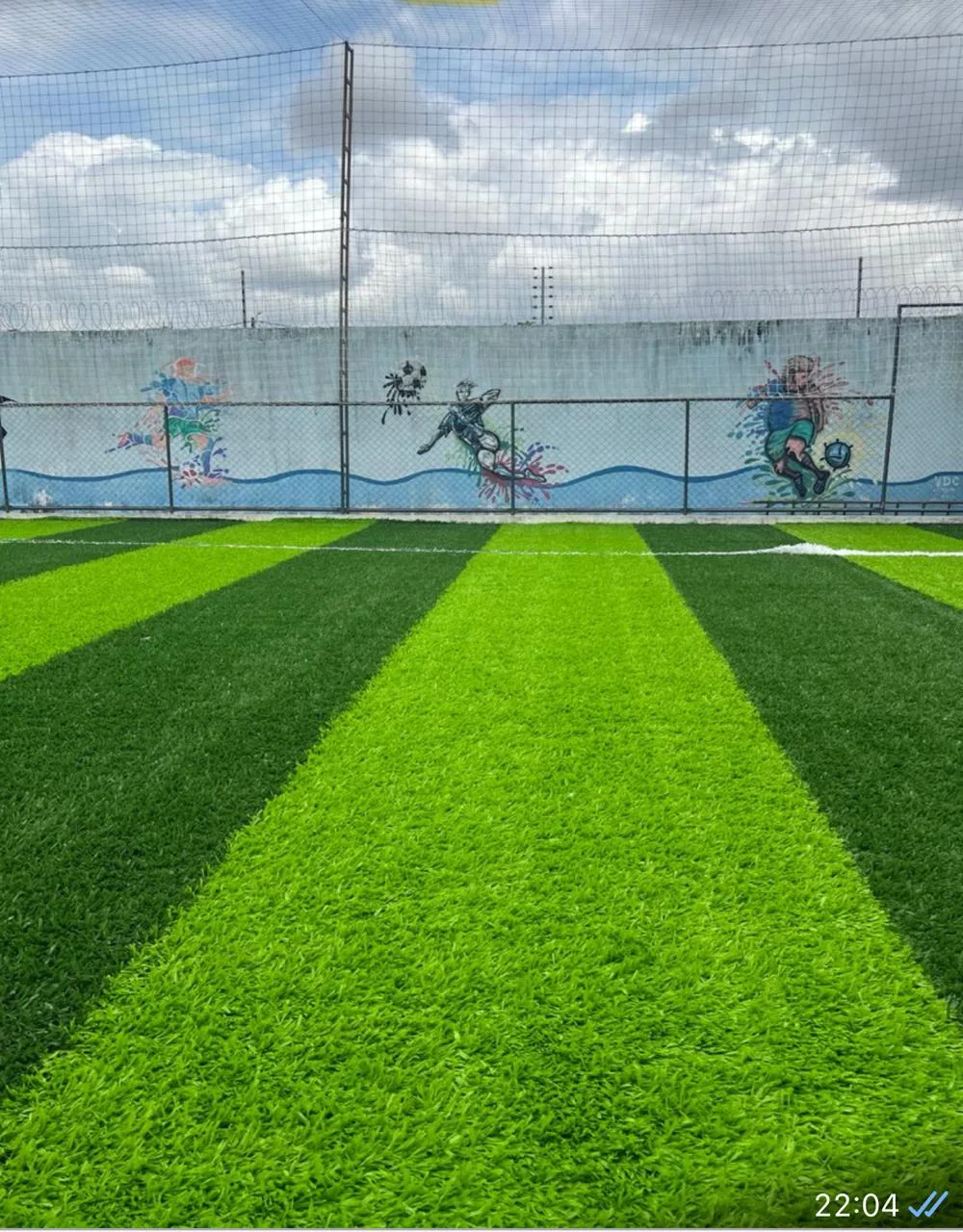 Grama sintética esportiva em quadra